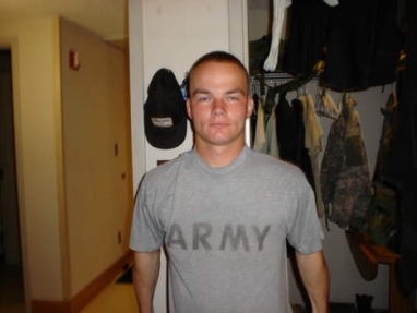 Cute shaved solider in grey army t-shirt