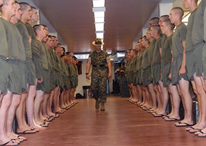 Drill instructor inspecting of dorm during boot camp